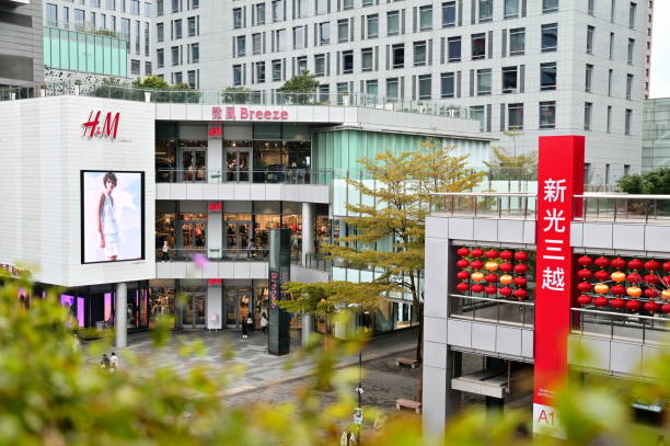 Taipei, Taiwan - Jan 26, 2024: The department stores on Xiangti Avenue Plaza in the Xinyi District are decorated with lanterns and colorful decorations to welcome the joyful Chinese New Year.