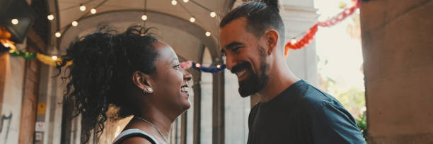 istock Happy interracial couple dancing outdoors, Panorama 1970246809