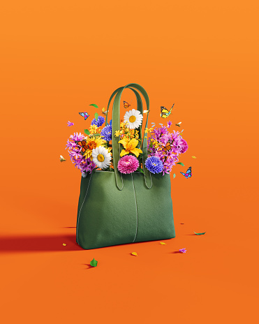 Green bag full of colorful spring flowers and butterflies on vibrant orange background. 3D Rendering, 3D Illustration