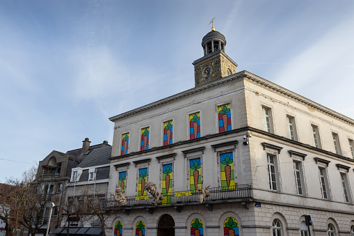 Ninove, Belgium, 29 January 2024: The Old Town Hall in Ninove, East Flanders, decorated for Carnival. The yearly carnival is celebrated by the city with a large street parade and other festivities.
