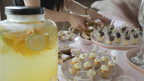 istock Buffet and snacks at a business event. Beautiful table setting in a restaurant. Preparation for the holiday, table setting by the waiter. Snacks on the table, catering concept. 1970281046