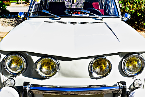 Detail of the headlights of an old car, classic, retro vehicle