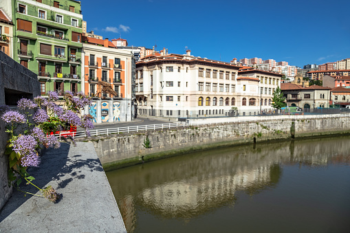 Old city architecture next to the River Bilbao lovely summer sunny day Bilbao Basque Country Northern Spain Europe