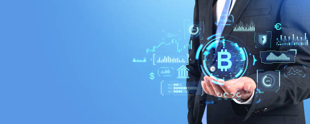 istock Man holding bitcoin glowing hologram hud with digital statistics, copy space 1970340497