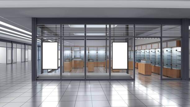 istock Store facade with glass storefront and blank glowing signboard mockup 1970359027