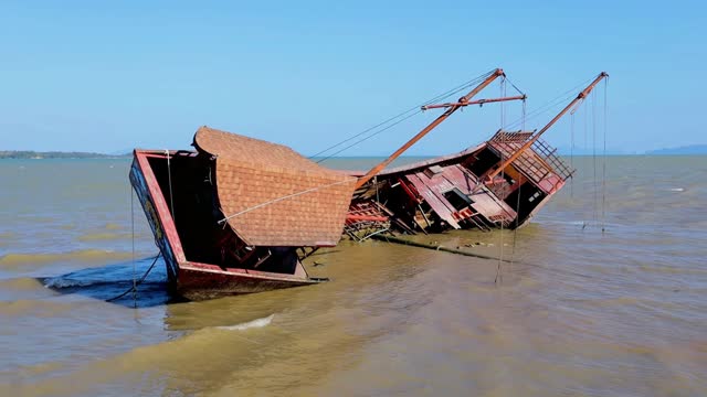 Half sunk shipwreck at Old Town Koh Lanta Thailand