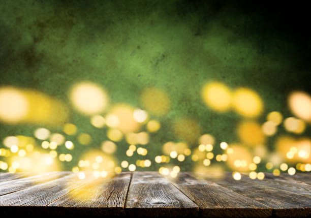 istock Happy St. Patricks Day background. Abstract green background with empty wooden table and glitter lights background. St. Patricks Day holidays wallpaper. 1970411341