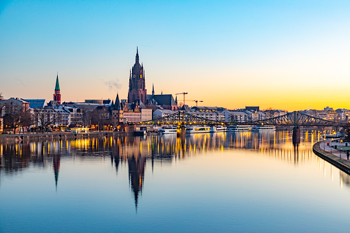 scenic skyline of Frankfurt am Main with reflection in the river, Hesse, Germany
