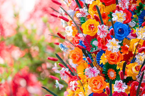 Flowers made of colored paper, in the Thanh Tien traditional village, Hue, Vietnam. Decoration in Tet Holiday and Lunar New Year in Vietnam