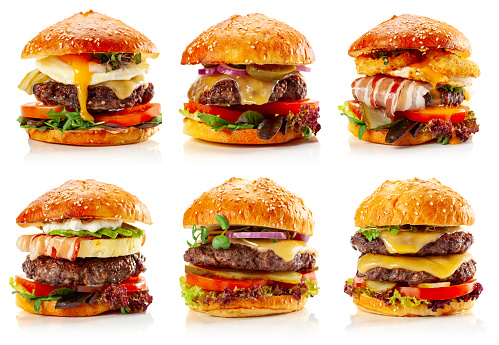 Set of fresh tasty burgers isolated on a white background.