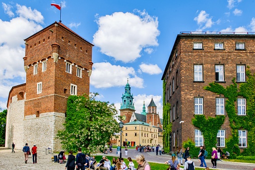 Krakow, Poland - June 12, 2023: View of Wawel Castle. On the left is the Senator's Tower or Lubranka, part of the fortifications of the fifteenth century.