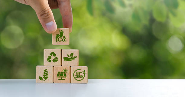 istock Reducing carbon emissions carbon neutral concept Net zero greenhouse gas emissions target The impact of human activities on the landscape and nature in general. Green block icon. Copy space 1970470311