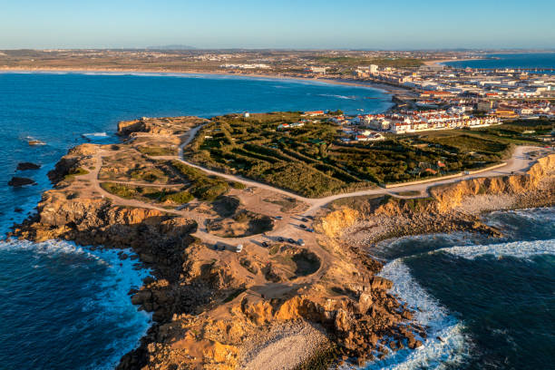 istock Peniche peninsula with high cliffs and ocean tide at sunset, Portugal 1970470822