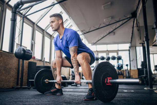 istock Man weightlifting in gym 1970487707