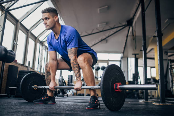istock Man weightlifting in gym 1970490803