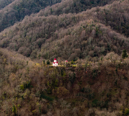 Small local church in the forest,  Georgia. Taken via drone.