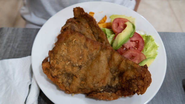 istock Dish with beef milanese and salad 1970544017