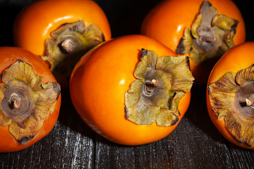 persimmon group on wood background