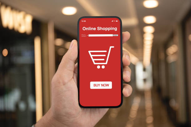 istock Man hand hold phone with app online shopping on screen 1970568633