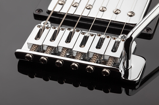 Black and white electric guitar on white background