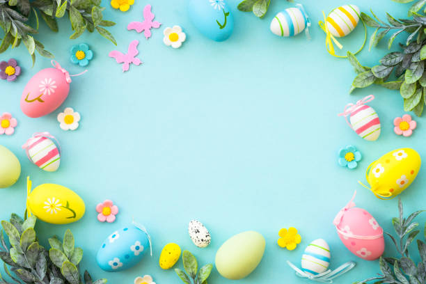 istock Easter background with Eggs and spring flowers at blue background. 1970572885