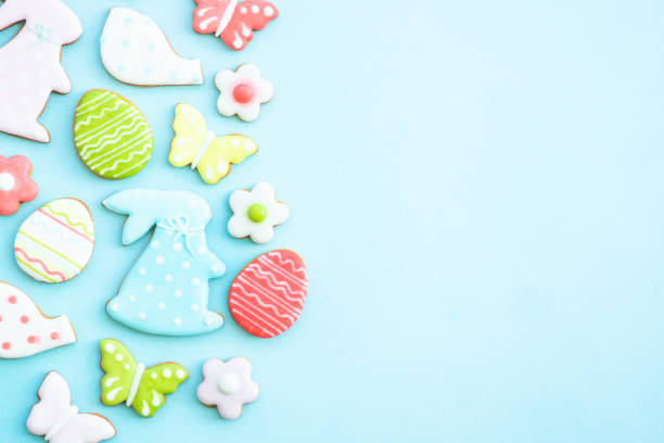 istock Easter gingerbread cookies top view on blue, 1970576582