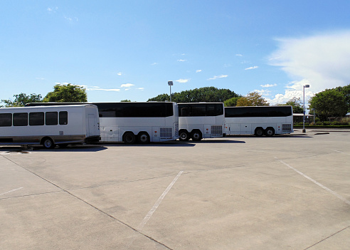 Looking out at parked tourist buses at a parking lot in Vancouver, B.C.