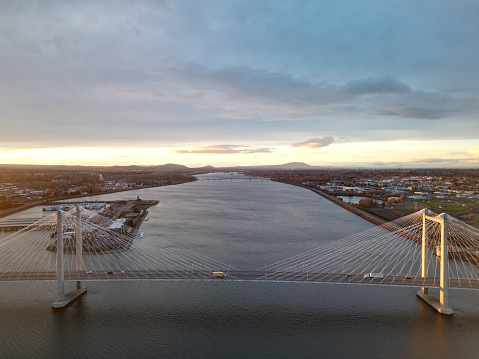 Dusk or Sunset above Columbia River with focus on Cable Bridge (Ed Hendler) bridge.