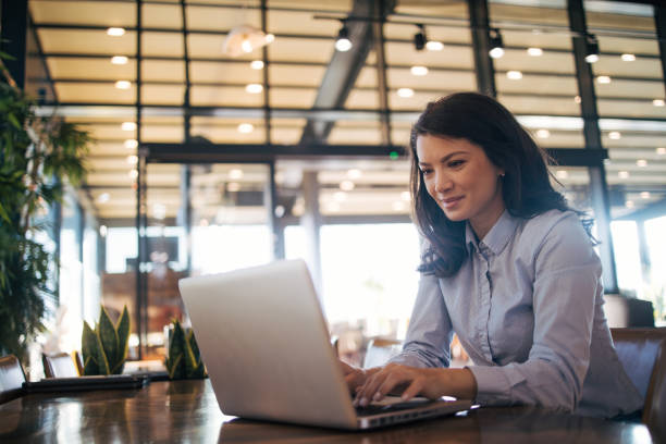istock Portrait of young attractive woman using digital tablet 1970618428
