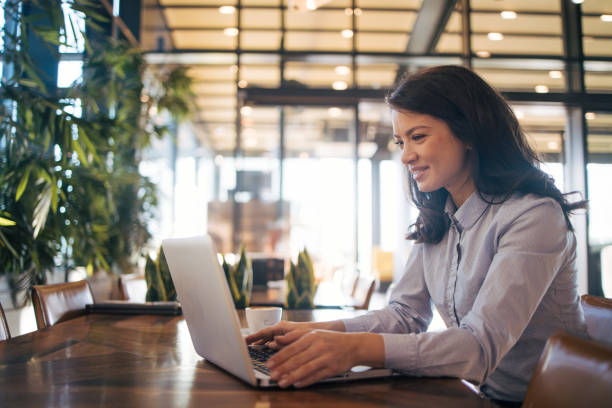 istock Portrait of young attractive woman using digital tablet 1970621546