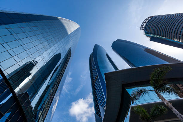 skyscraper, abu dhabi, uae huge skyscrapers in abu dhabi city, united arab emirates. corniche stock pictures, royalty-free photos & images