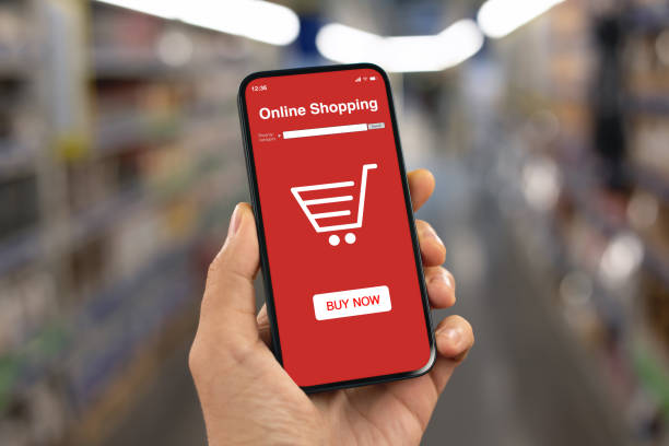 istock man hand hold phone with app online shopping on screen 1970660352