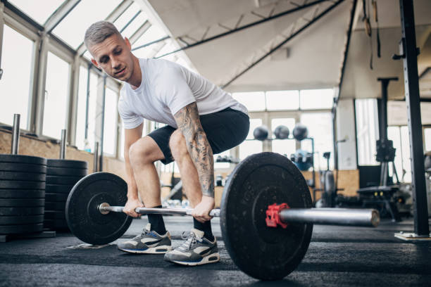 istock Man weightlifting in gym 1970704690