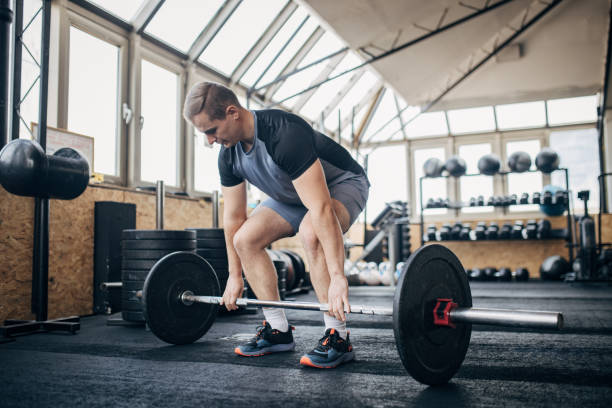 istock Man weightlifting in gym 1970705224