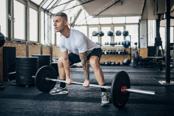 istock Man weightlifting in gym 1970706268
