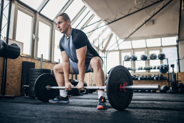 istock Man weightlifting in gym 1970708393