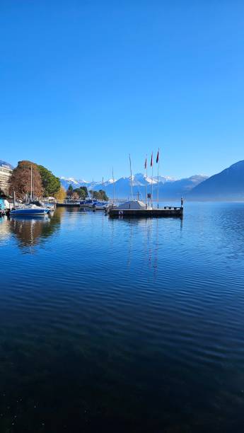 istock Swiss Serenity: Lakeside Tranquility and Snowy Peaks 1970709931
