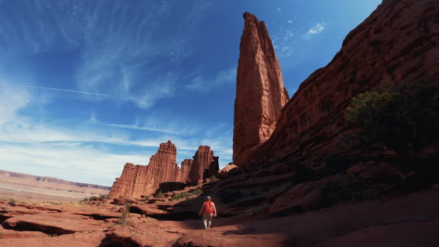Hiking under the Fisher Towers, desert of Southwest USA