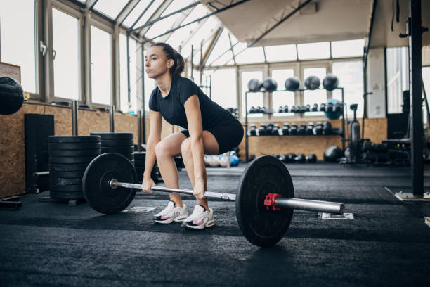 istock Woman weightlifting 1970726687