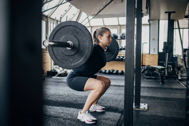 istock Woman weightlifting 1970728756