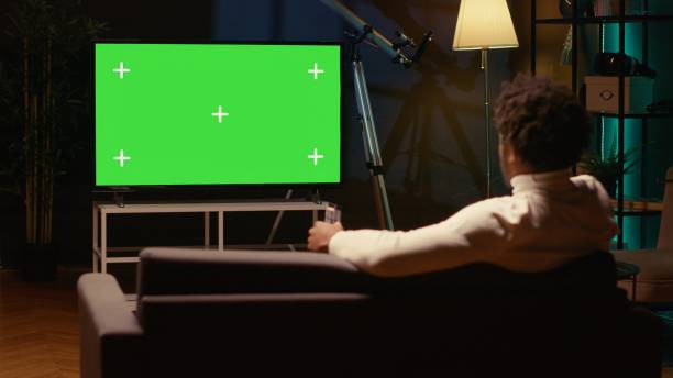 istock Person using mockup television set to enjoy leisure time 1970731347