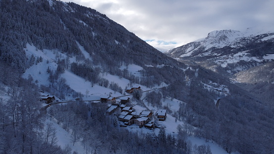 Drone shot of a small village under the snow in Savoie