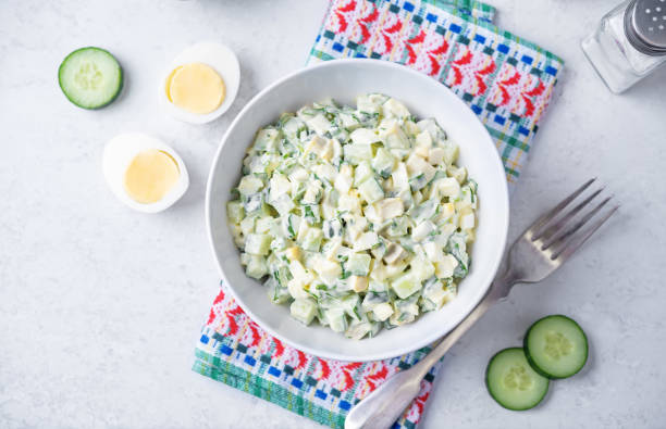 istock Egg cucumber avocado salad with mayonnaise sauce in a bowl 1970762719