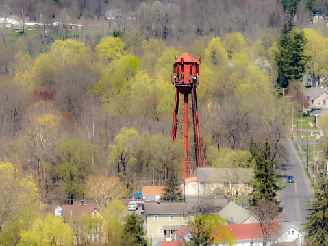 Spring afternoon aerial photo of the water tower located in the hamlet of Wallkill, Town of Shawangunk, NY, USA	04-14-2023.