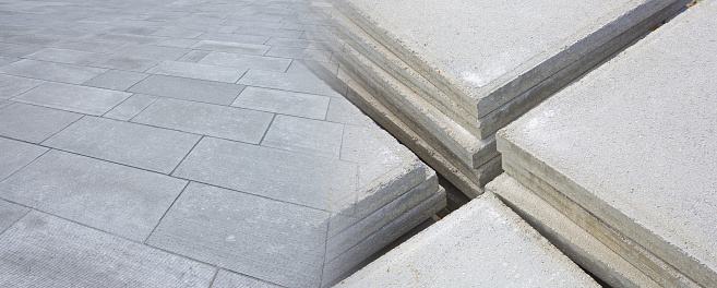 New paving made with stone or concrete blocks with concrete slabs in a construction site for pavement used in pedestrian areas