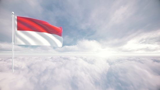 National flag soaring in sky, Flag waving proudly above clouds at sunrise