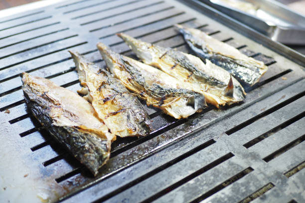 Baking and roasting fish on barbecue grill