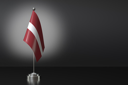 Small National Flag of the Latvia on a Black Background. 3d Rendering
