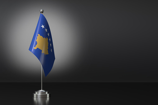 Small National Flag of the Kosovo on a Black Background. 3d Rendering