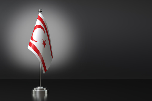 Small National Flag of the Northern Cyprus on a Black Background. 3d Rendering